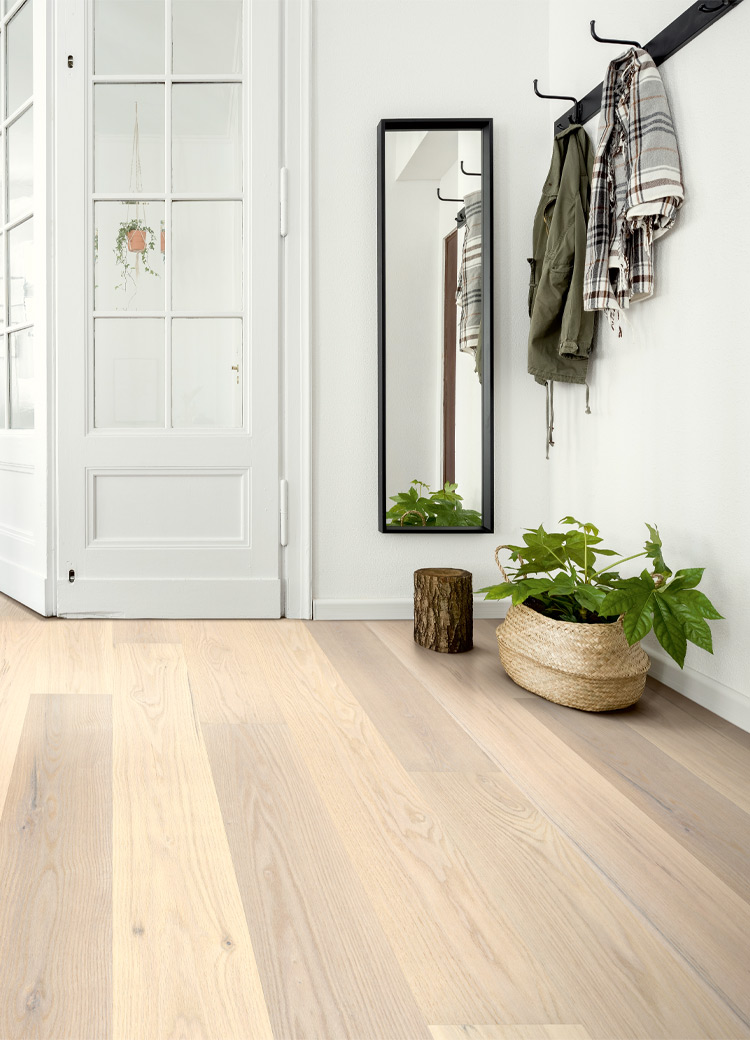 light wood flooring in mudroom