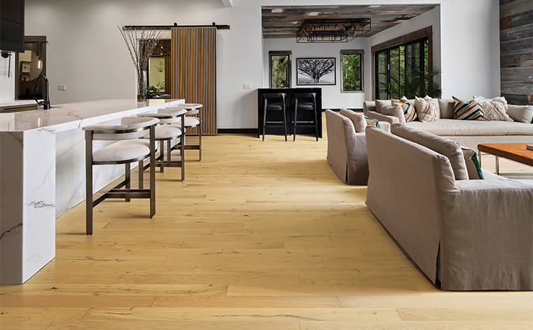 hardwood flooring in a kitchen and living room area